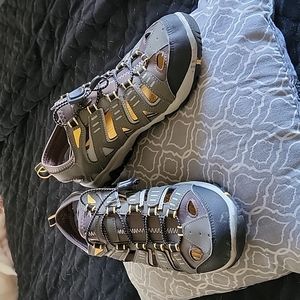 Brand new pair of water shoes ...size 9 in men